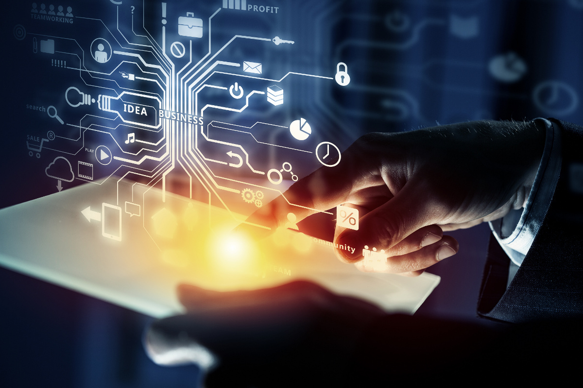 Close Up of Businessman's Hands Using Tablet with Digital Cloud Computing Concept Overlay